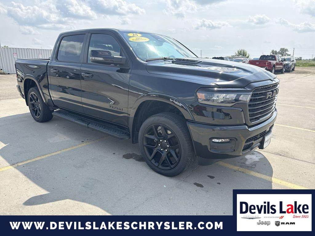 2025 RAM 1500 Laramie in Diamond Black Crystal Pearlcoat — front three-quarter view
