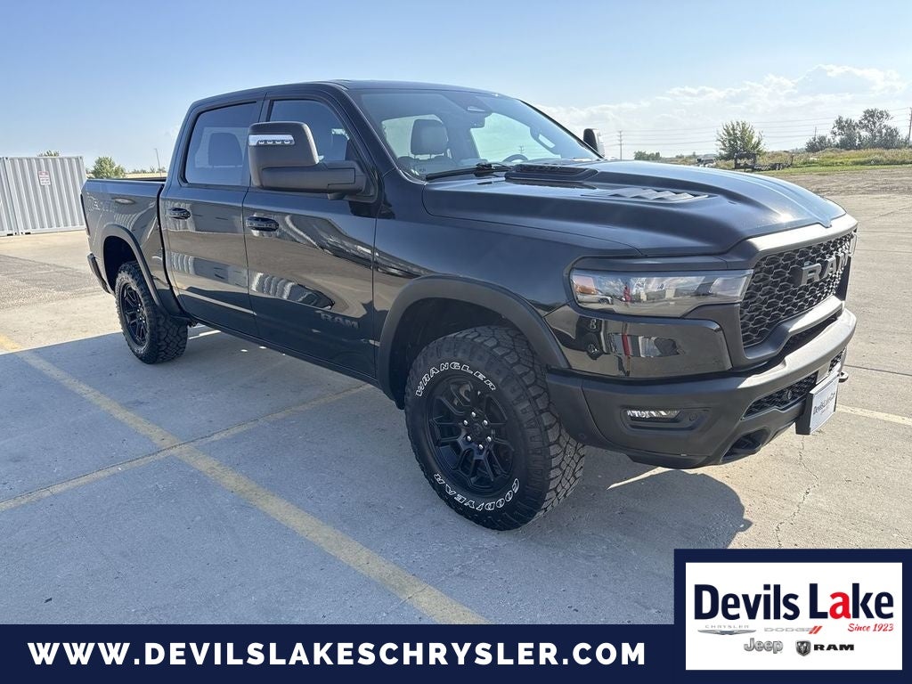 2025 RAM 1500 Rebel in Diamond Black Crystal Pearlcoat — front three-quarter view