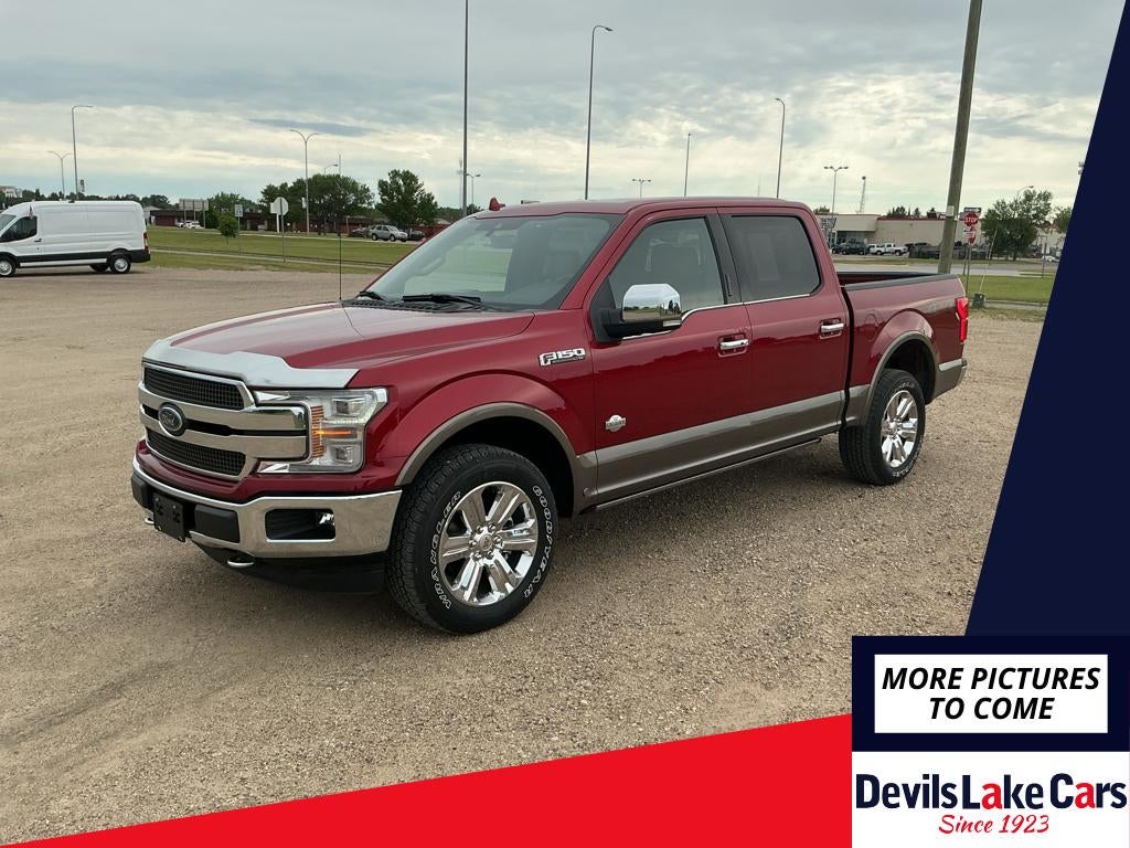 2019 Ford F-150 King Ranch in Ruby Red Metallic Tinted Clearcoat — front three-quarter view