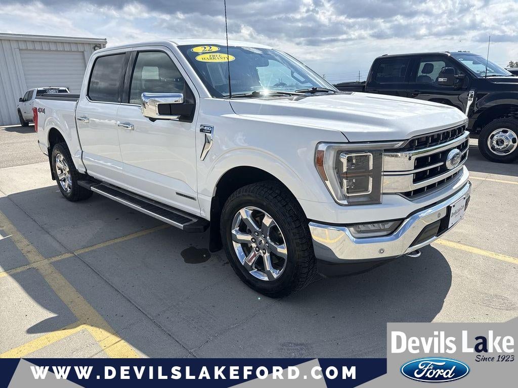2022 Ford F-150 LARIAT in Star White Metallic Tri-Coat — front three-quarter view