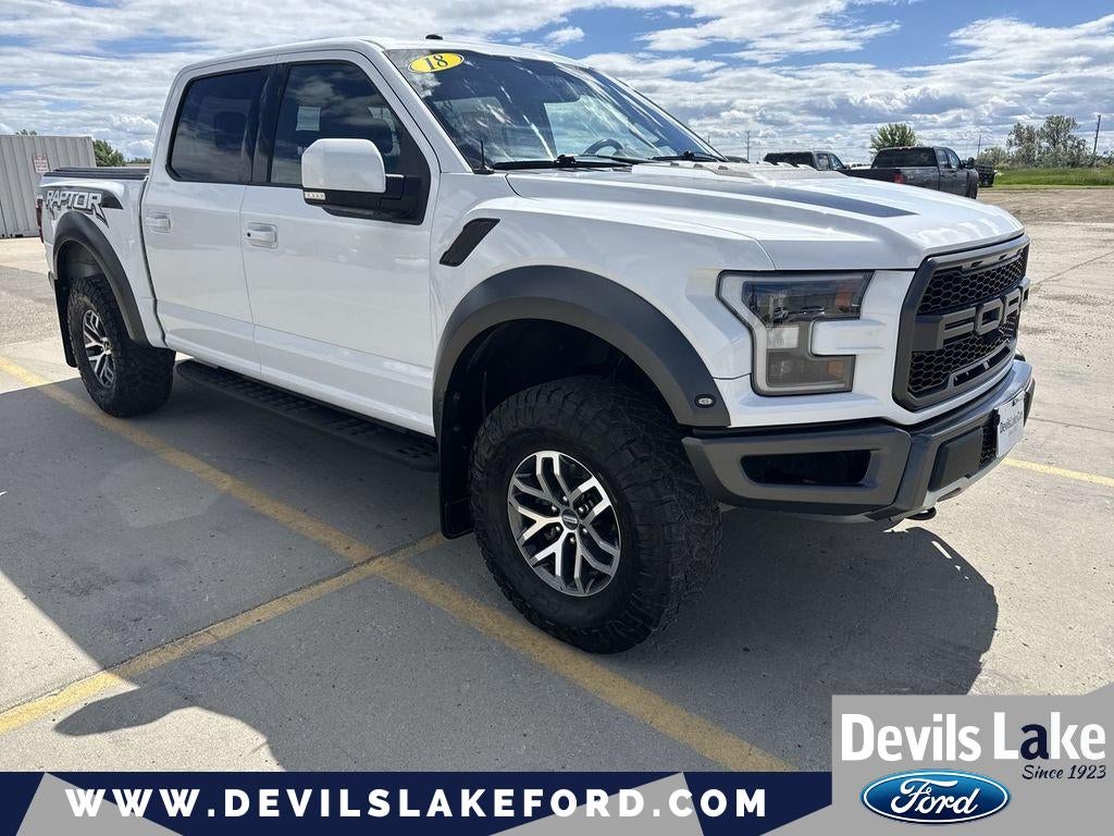 2018 Ford F-150 Raptor in Oxford White — front three-quarter view