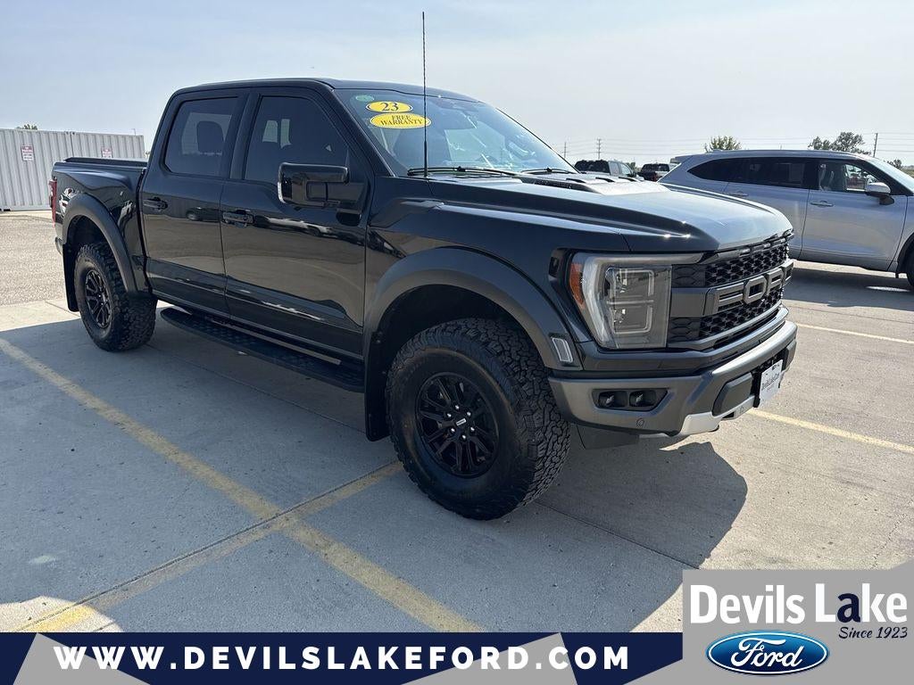 2023 Ford F-150 Raptor in Agate Black Metallic — front three-quarter view