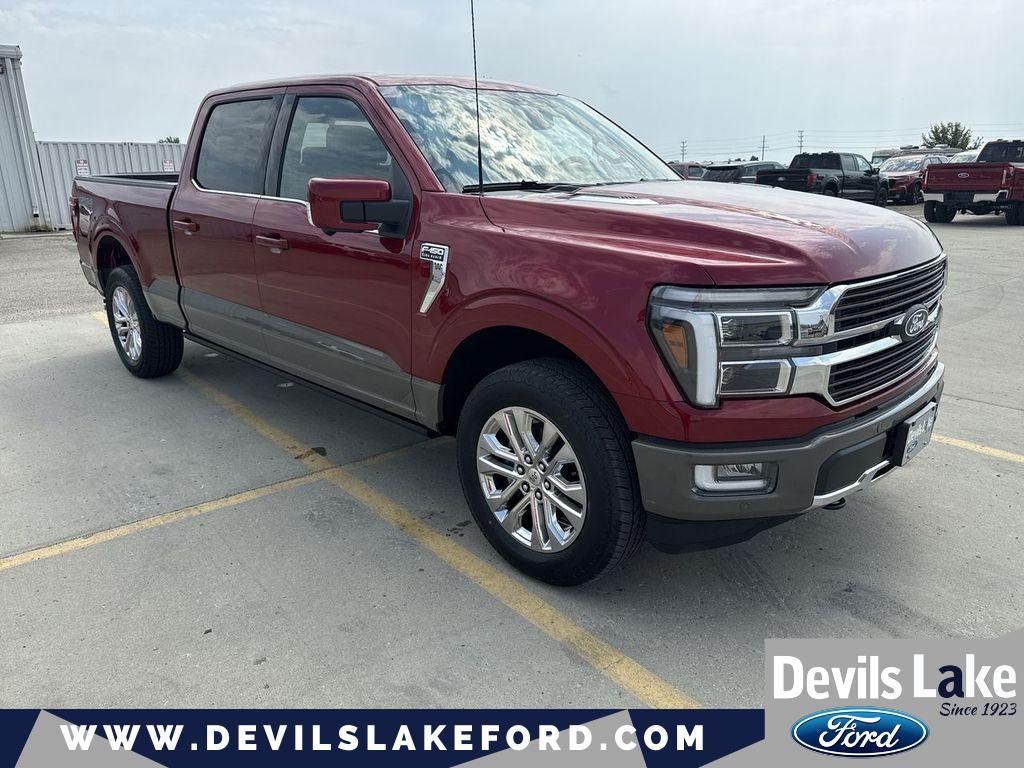 2026 Ford F-150 King Ranch in Ruby Red Metallic Tinted Cc — front three-quarter view