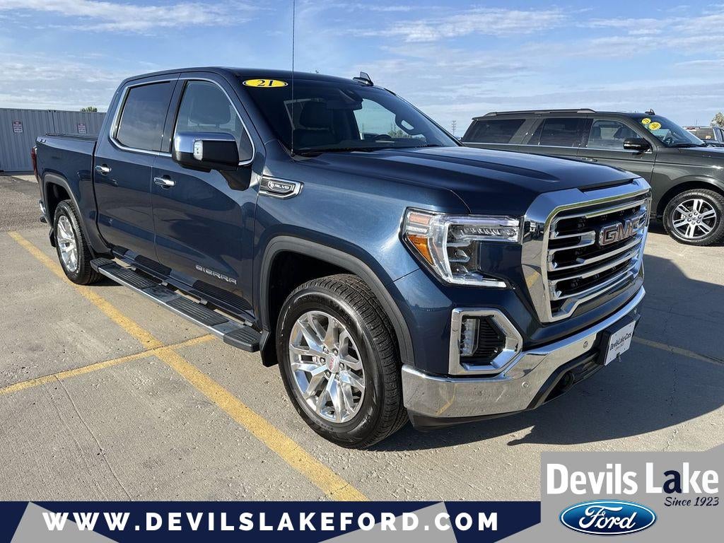 2021 GMC Sierra SLT in Pacific Blue Metallic — front three-quarter view